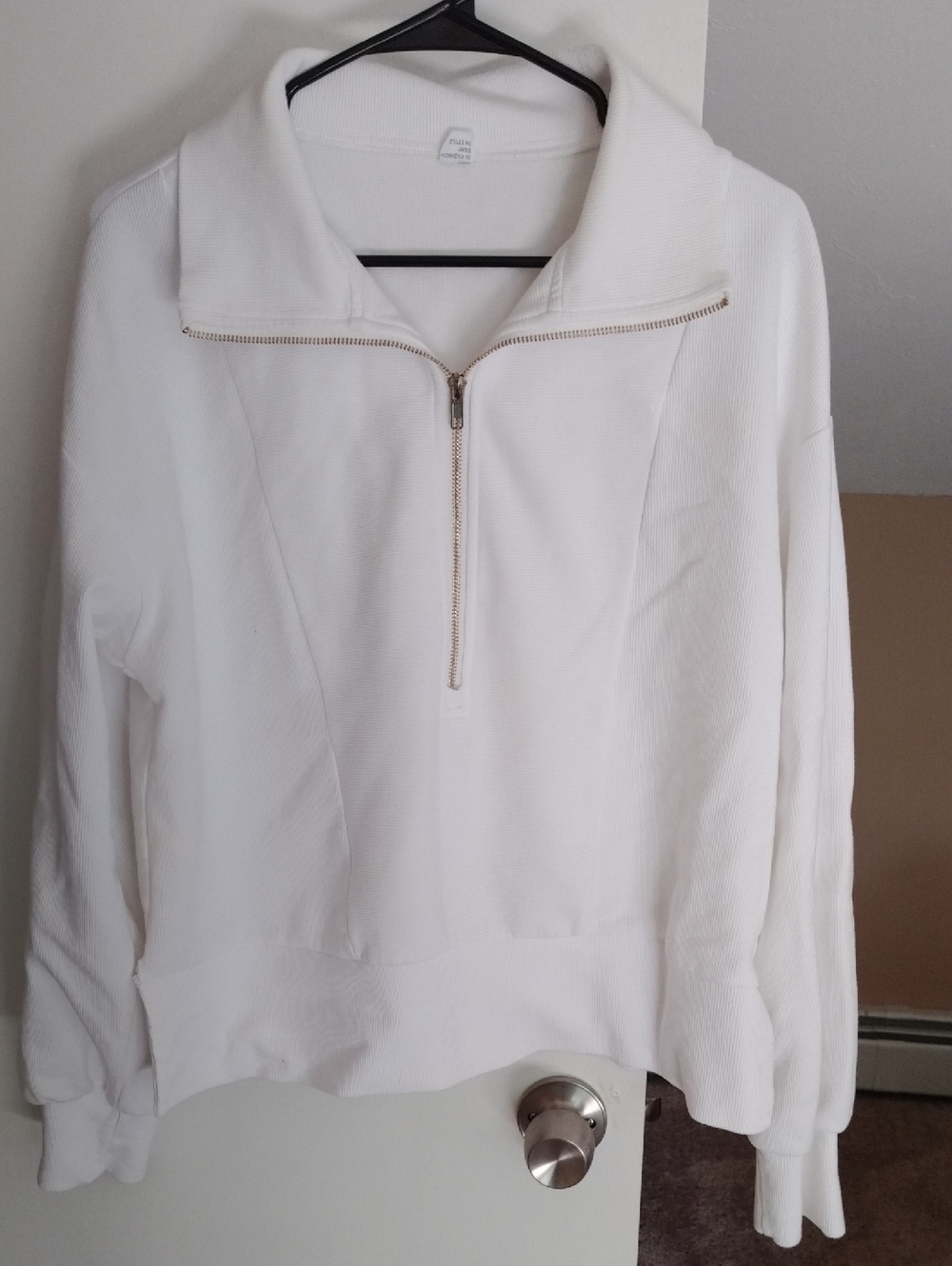 Analog White Half-Zip Sweatshirt with Gold Zipper Detail